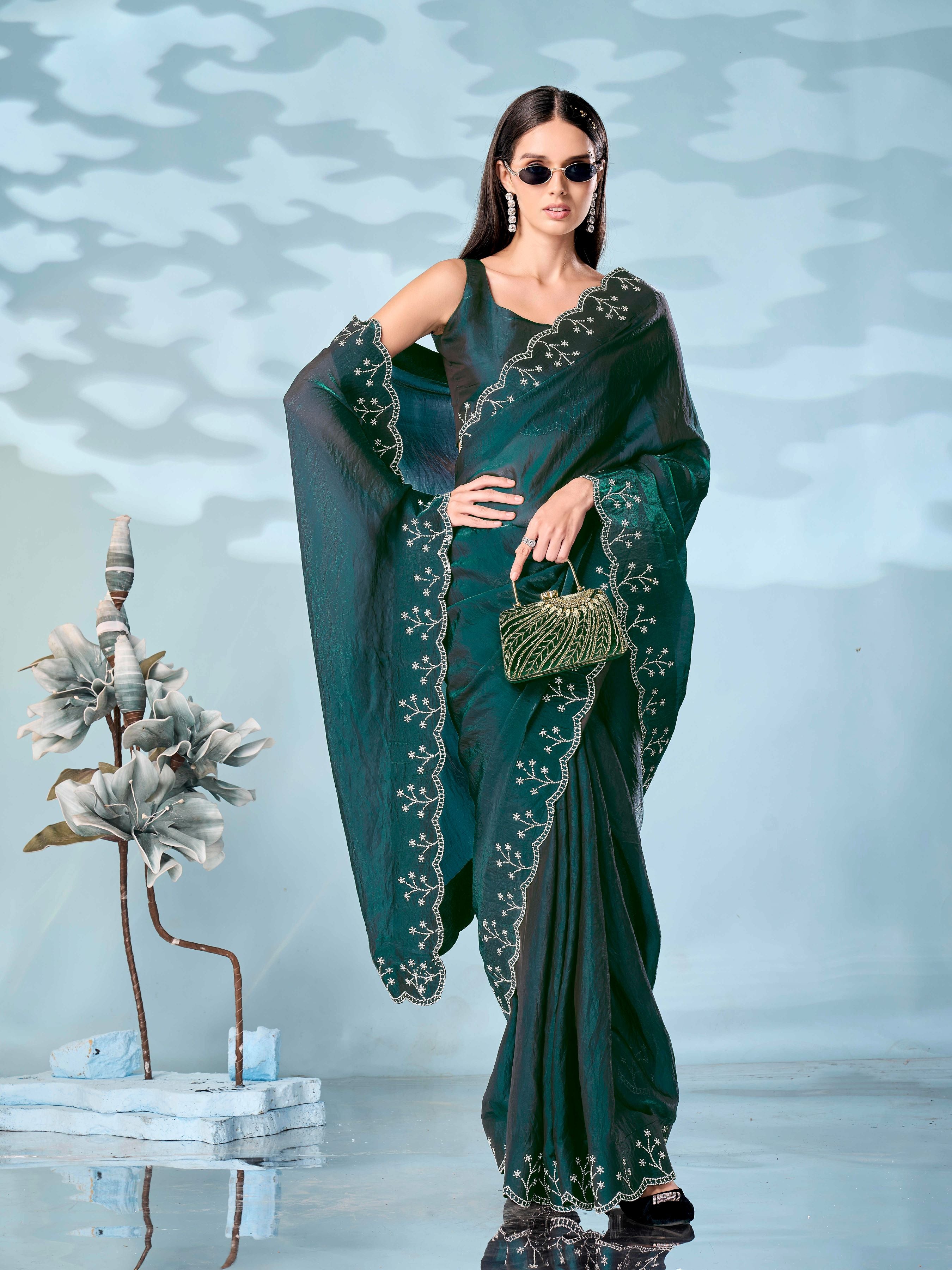 Two tone green & maroon colored satin saree with heavy work